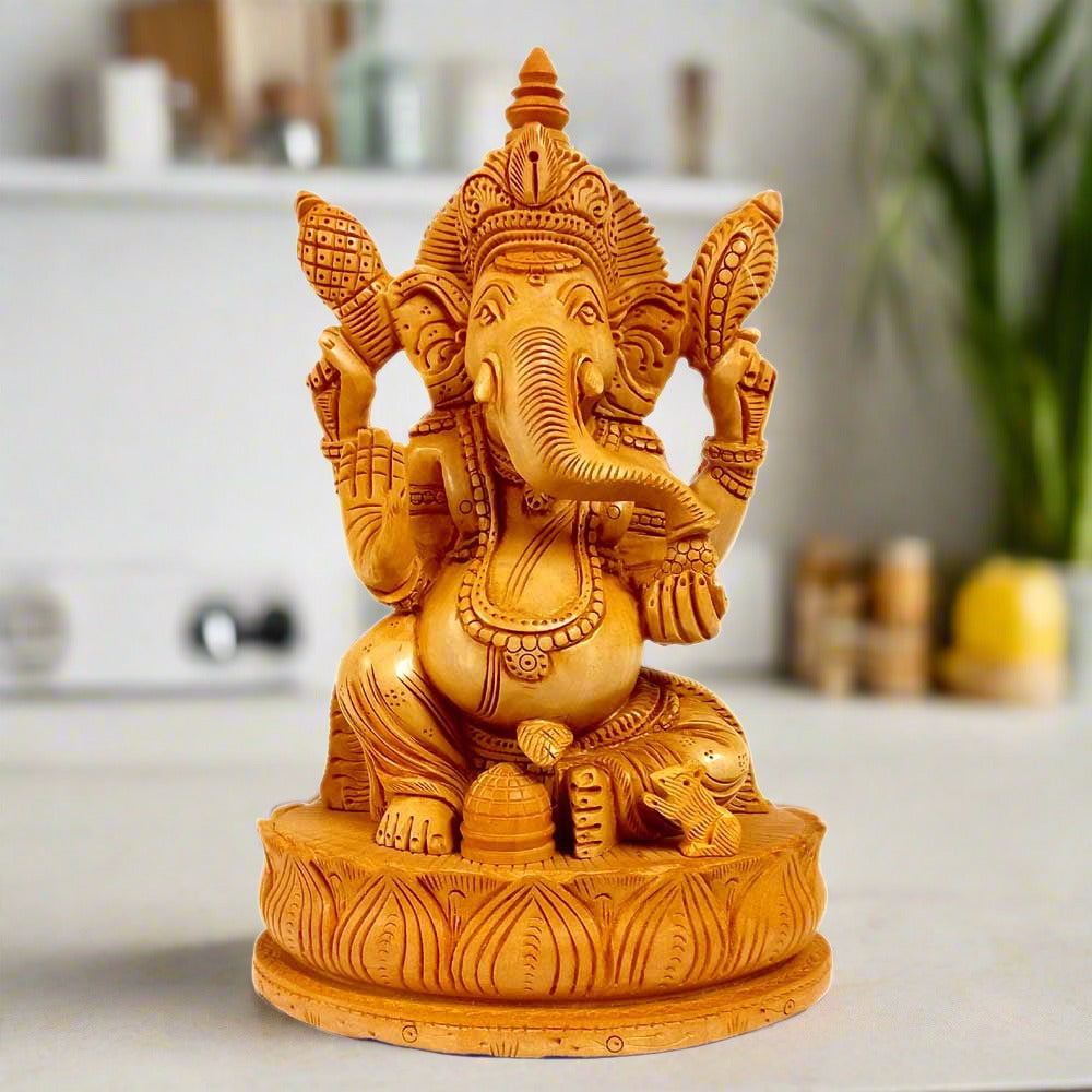 Handcrafted Kadamba wood lotus Ganesha idol with fine carving details by Jaipur artisans.