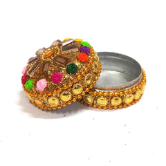 A small kumkum box, ideal as a gift for a wedding or festival.
