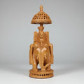 23cm Kadamba wood Ambari elephant featuring intricate hand-carved lattice undercut patterns.