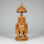 23cm Kadamba wood Ambari elephant featuring intricate hand-carved lattice undercut patterns.