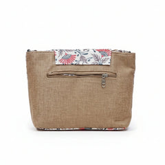 Close up of the light textured pastel floral fabric and golden button hardware