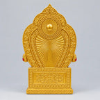 Back view of seated Lord Kuber statue showing the rear of the throne and decorative arch