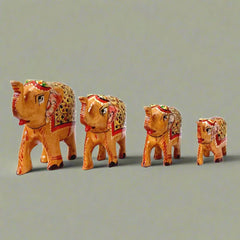 A lucky elephant family figurine set with trunks up, a symbol of good fortune.