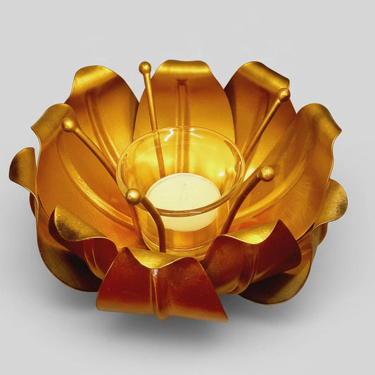 Unique lotus design metal candle holder used as a luxury home decor accent.