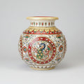 Sophisticated spherical marble decorative vase with a majestic peacock centerpiece and colorful hand-painted floral accents.
