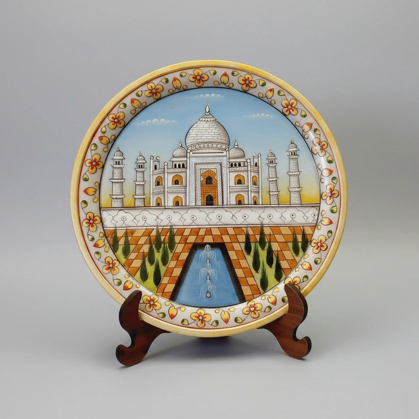 Premium 9-inch white marble souvenir plate with a scenic Taj Mahal illustration, serving as a sophisticated cultural gift or travel keepsake.