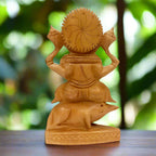 A magnificent Kadamba wood Ganesh showpiece seated on a Mooshak (mouse).