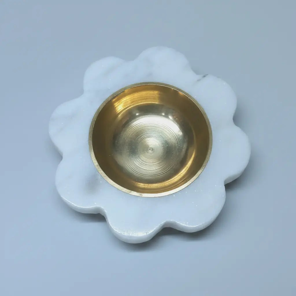 Top view of White Marble Diya with Golden Brass Bowl Insert