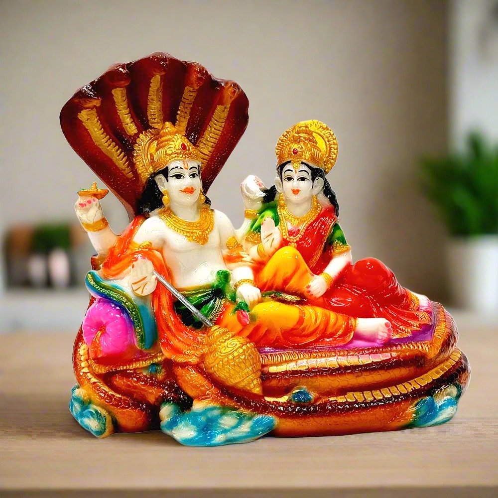 Marble dust Vishnu Lakshmi idol for worship and home temple décor.
