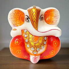 Handmade Italian marble Ganesh idol with golden, orange and red painting