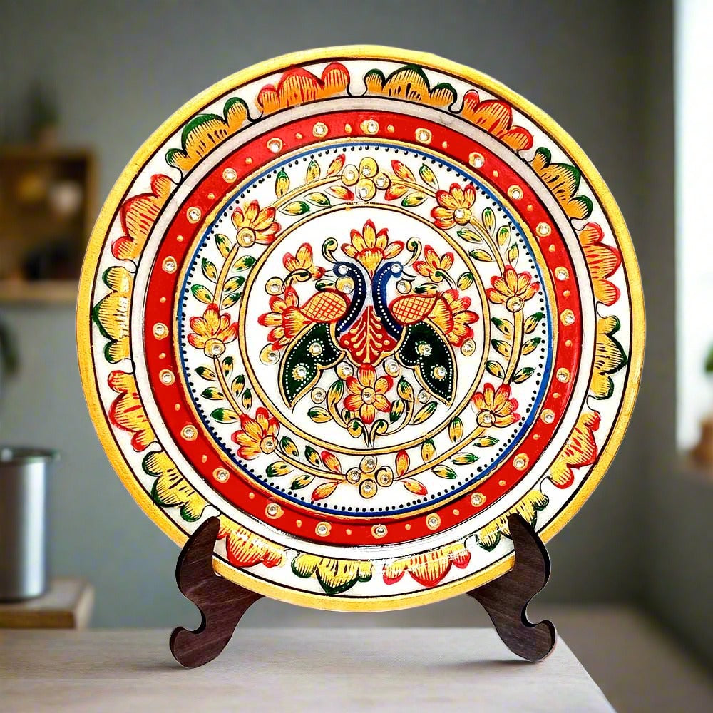 A hand-painted marble decorative plate with intricate details, including a wooden stand.