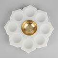 White Marble Lotus 9 Diya Plate with Brass Bowl in Festive Pooja Setup with Marigolds