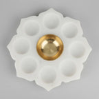 White Marble Lotus 9 Diya Plate with Brass Bowl in Festive Pooja Setup with Marigolds