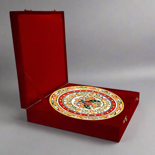 25cm diameter marble plate with intricate hand-painted floral artwork, crafted by Jaipur artisans, complete with velvet gift box and wooden display stand.