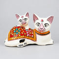 Front view of a white Meenakari cat and kitten showpiece with colourful floral patterns and gold borders