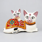 Front view of a white Meenakari cat and kitten showpiece with colourful floral patterns and gold borders