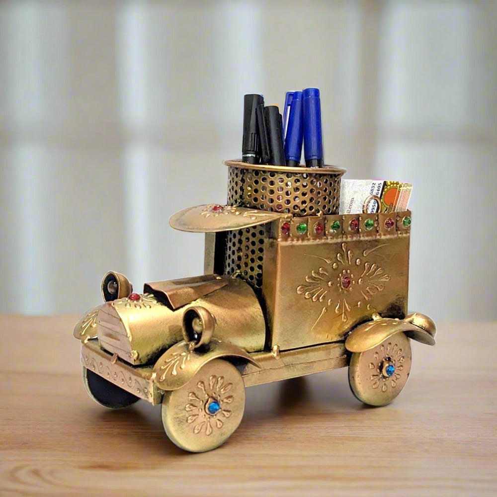 A metal car model that serves as both a visiting card holder and a pen stand.
