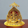 A metal idol of Lord Ganesha with his consorts Riddhi and Siddhi, perfect for home decor.