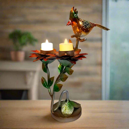 Decorative candle holder with a bird design