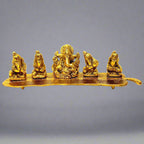 A metal musician Ganesh statue with a golden oxidized polish, featuring five Ganesha playing music.
