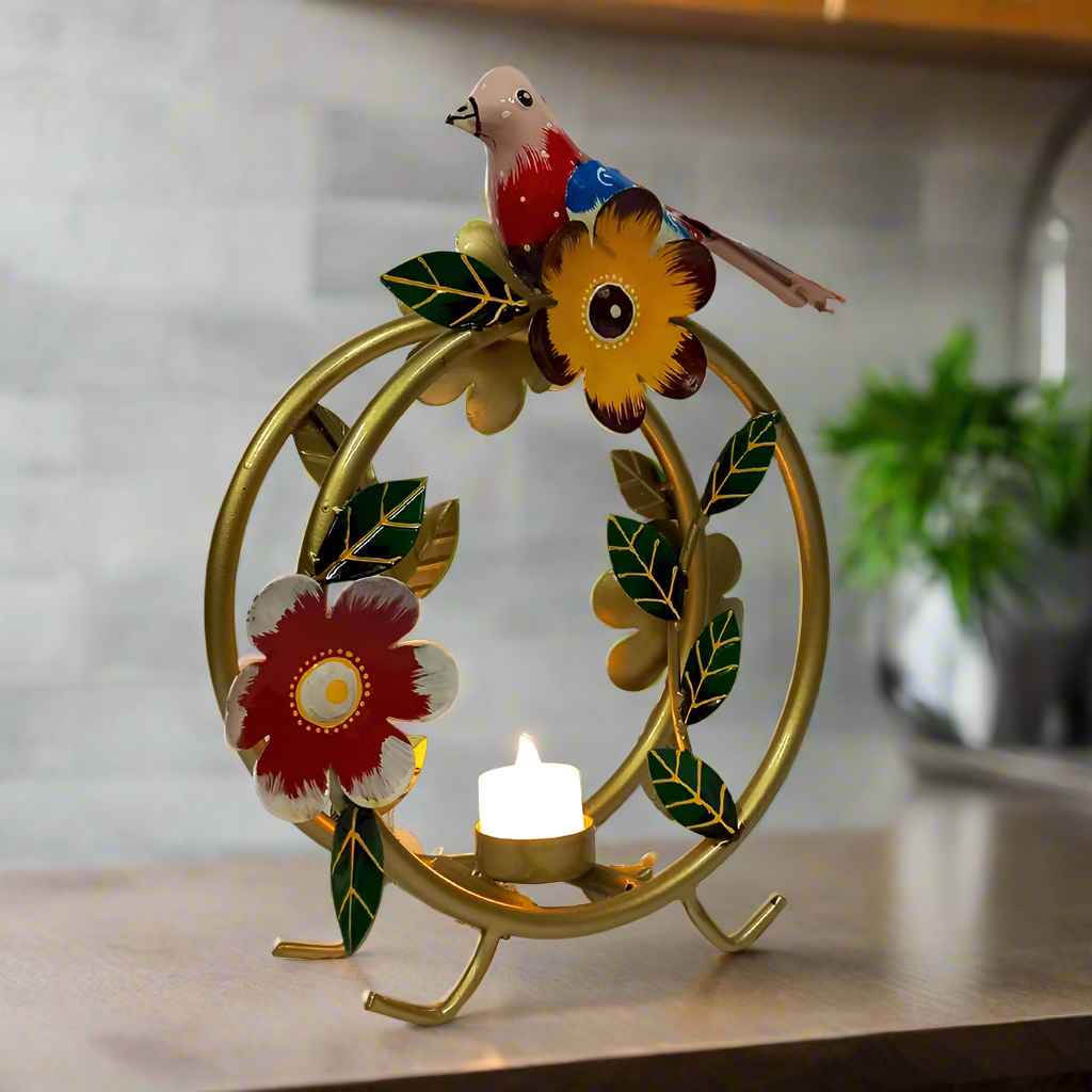 Round Metal Candle Holder with Intricate Floral and Bird Motif Design