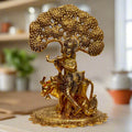 Elegant Krishna idol with cow and tree – handcrafted Indian metal statue for home décor and pooja.