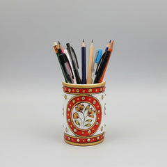 A sleek white marble pencil holder with vibrant floral hand-painting, blending traditional art with modern home office decor.