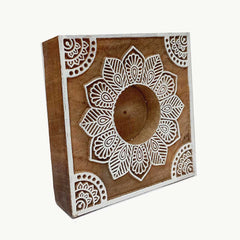 A modern wooden candle stand with a minimalist design, a perfect accent for any contemporary space.