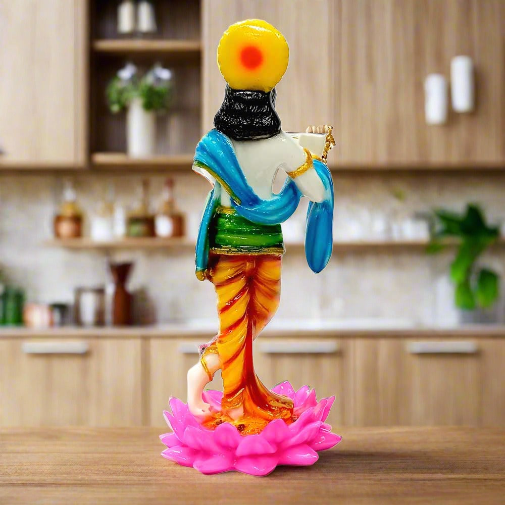 A multi-color Krishna figurine, a popular showpiece and gift item.