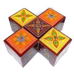 A multi-colored wooden dry fruit container, a beautiful way to keep your dried fruits fresh.