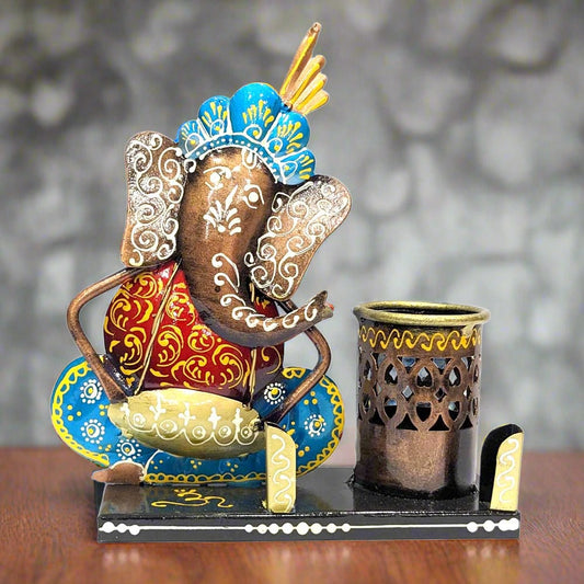 A Ganesha metal pen organizer for your office desk, perfect for keeping pens, pencils, and cards.

