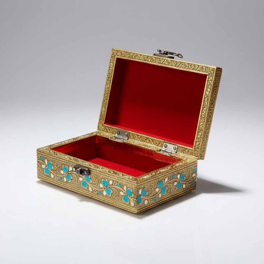 Velvet-lined interior of oxidized gold meenakari peacock jewellery box for rings and earrings