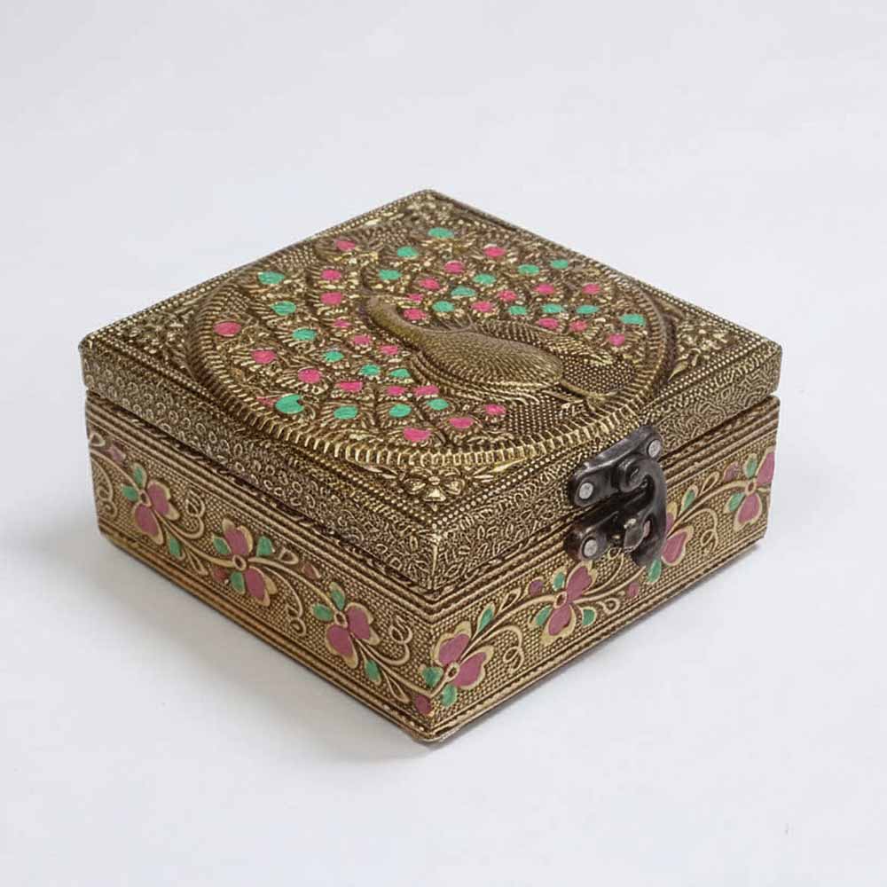 Detailed golden oxidized peacock lid on 10x10 cm wooden box for elegant gifting.