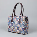 Close-up detail of high-grade Patola fabric stitching and premium synthetic PU leather accents.