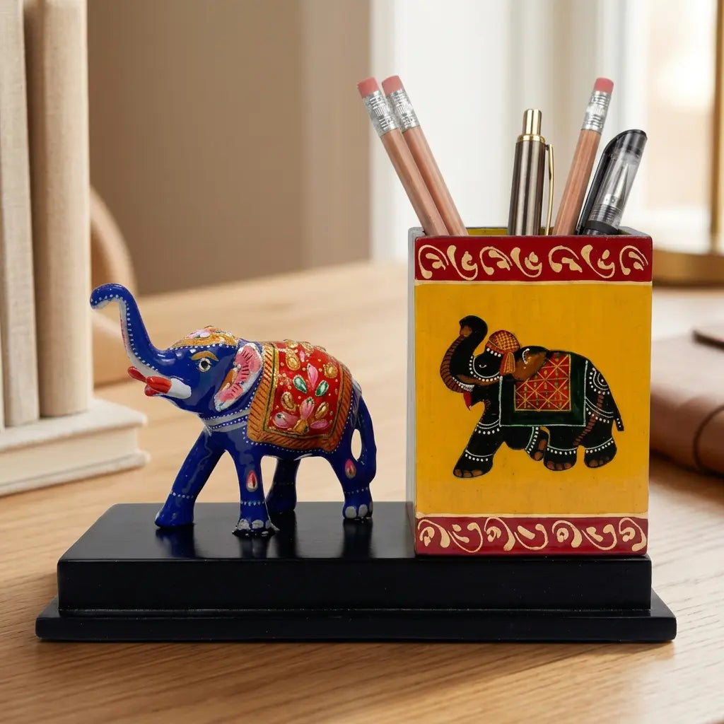 Wood and metal pen stand with a square holder and a Meenakari painted elephant with a raised trunk
