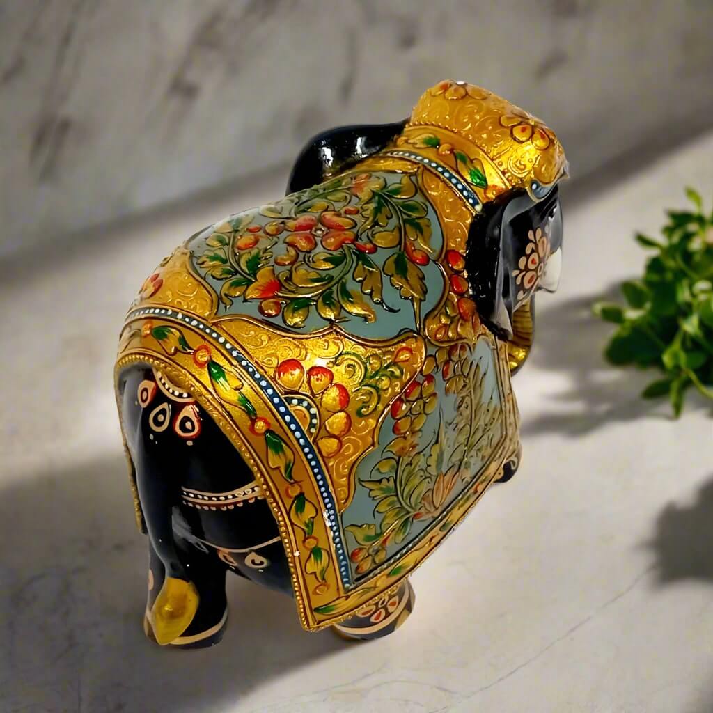Premium wooden elephant idol hand-painted with golden emboss and traditional motifs