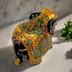 Premium wooden elephant idol hand-painted with golden emboss and traditional motifs