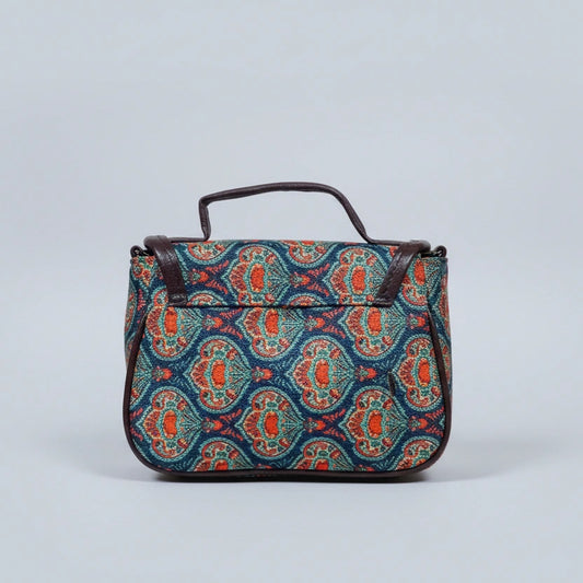 back of the premium PU leather top handle on the floral fabric bag