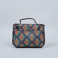 back of the premium PU leather top handle on the floral fabric bag