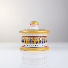 Round pure marble Kumkum box decorated with blue and white stone work.