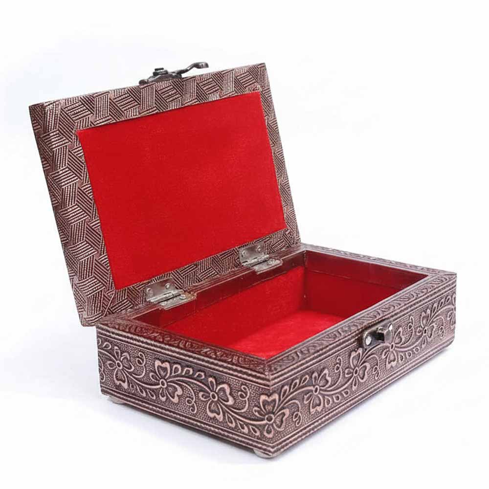 Open wooden gift box revealing soft velvet interior lining for jewelry storage.