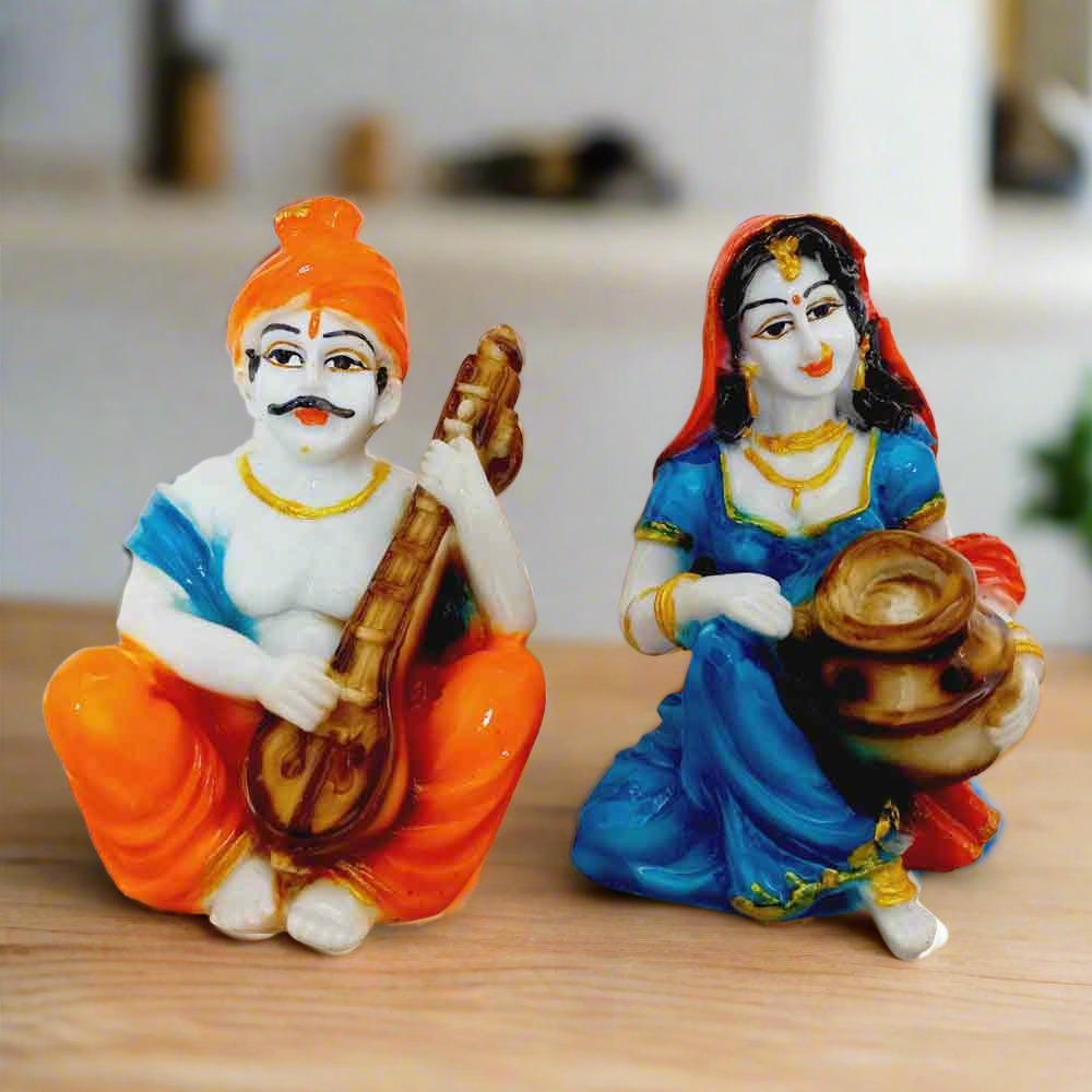 Hand-painted Rajasthani couple figurines made of marble dust, traditional multicolor decor