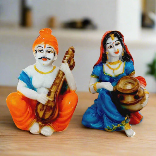 Hand-painted Rajasthani couple figurines made of marble dust, traditional multicolor decor