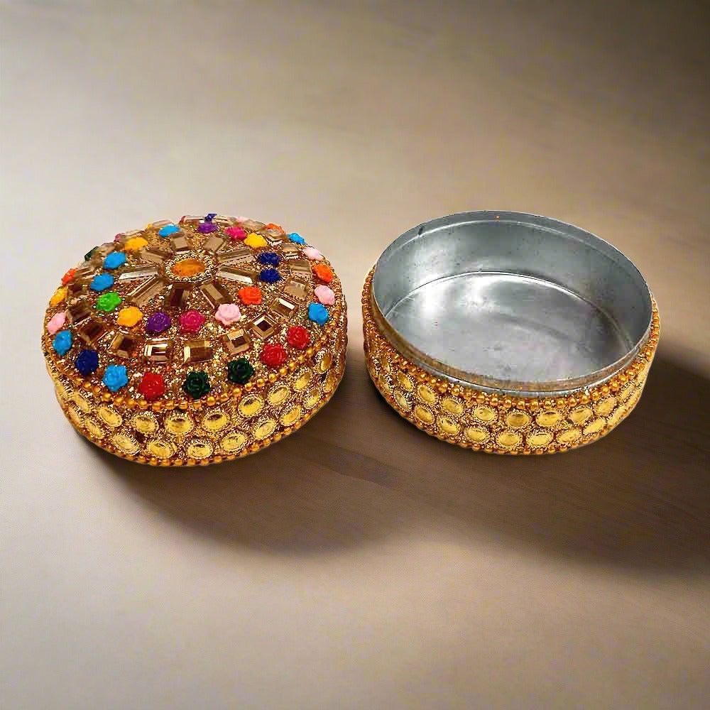 A traditional Rajasthani lac box, beautifully decorated and perfect as a gift.