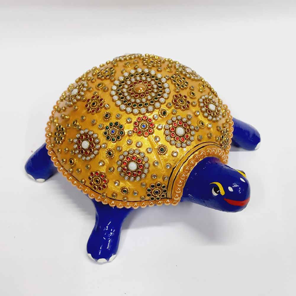 Vastu meenakari tortoise statue in rajasthani art.