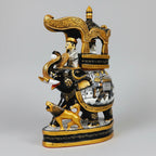 Close-up of intricate Rajasthani miniature painting and fine brushwork on a solid timber elephant statue.
