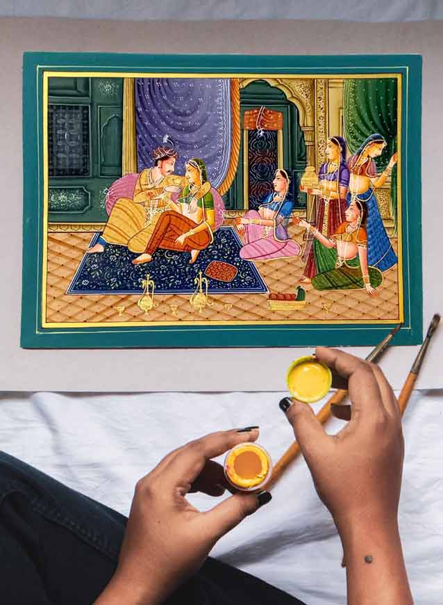 Authentic Rajasthani painting artists from Jaipur showcasing handmade artwork and traditional gemstone paintings at KK Gift Store.
