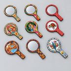 Rajasthani print hand mirrors arranged in rows, showing round mirror fronts and decorative backs with floral, peacock, elephant and traditional figure designs.