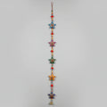 3 feet long handmade Rajasthani star-shaped wall hanging with hand-painted stars and decorative brass bell.