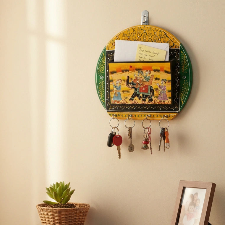 Hand-painted Rajasthani decorative key holder and mail organizer made of seasoned wood, featuring traditional Indian folk motifs and vibrant colors.